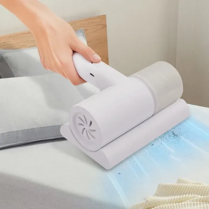 Aspirateur sans fil adapté à un usage domestique élimine les acariens de la literie un mini aspirateur adapté aux lits.