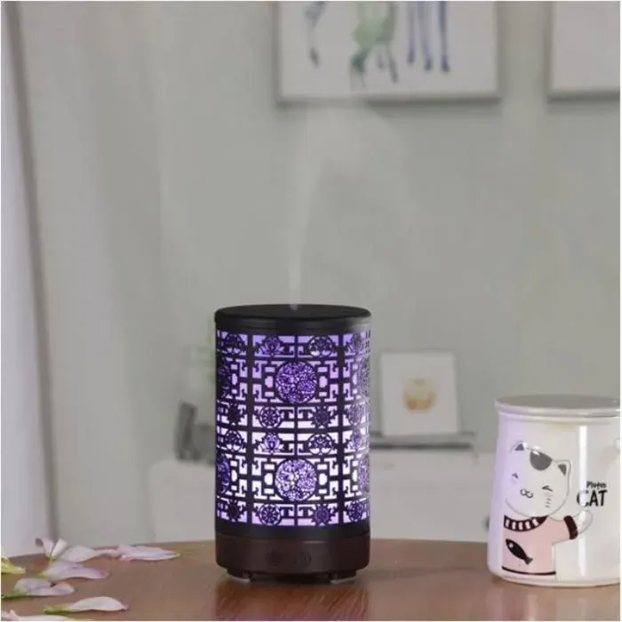 Les lumières colorées dhumidificateur de diffuseur darôme dart de fer peuvent ajouter latomisation dhuile