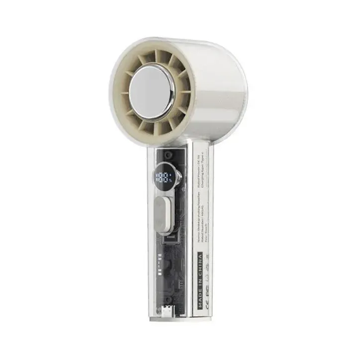 Ventilateur de voyage compact et silencieux avec vitesse réglable texture ABS crème.