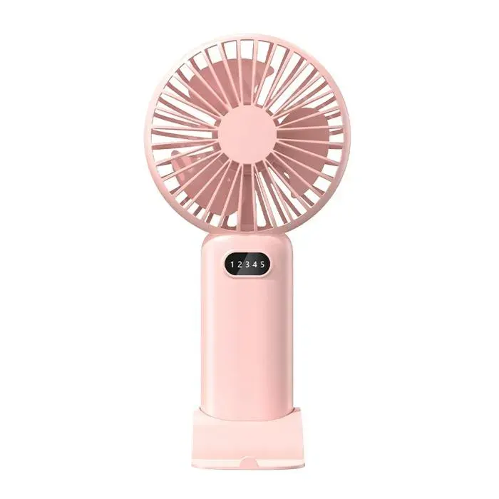 Ventilateur portable rose rechargeable par USB trois vitesses adapté pour le bureau lextérieur et les dortoirs.